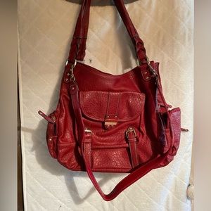 Rossetti red leather pocketbook.